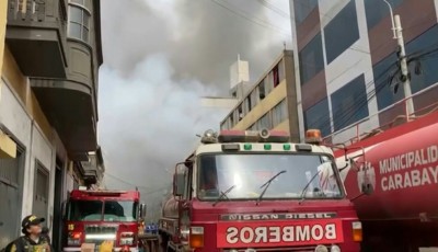 Firefighters Battle Massive Blaze in Lima's Historic District for Second Day Image
