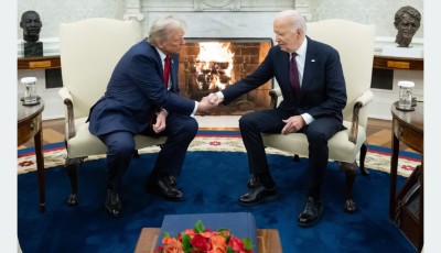 In the White House, Trump and Biden shake hand Image